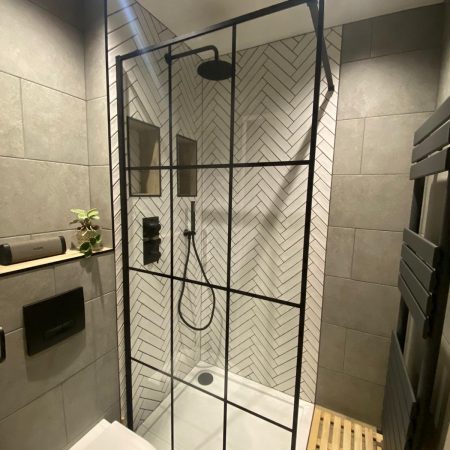 Herringbone & stone walk-in shower