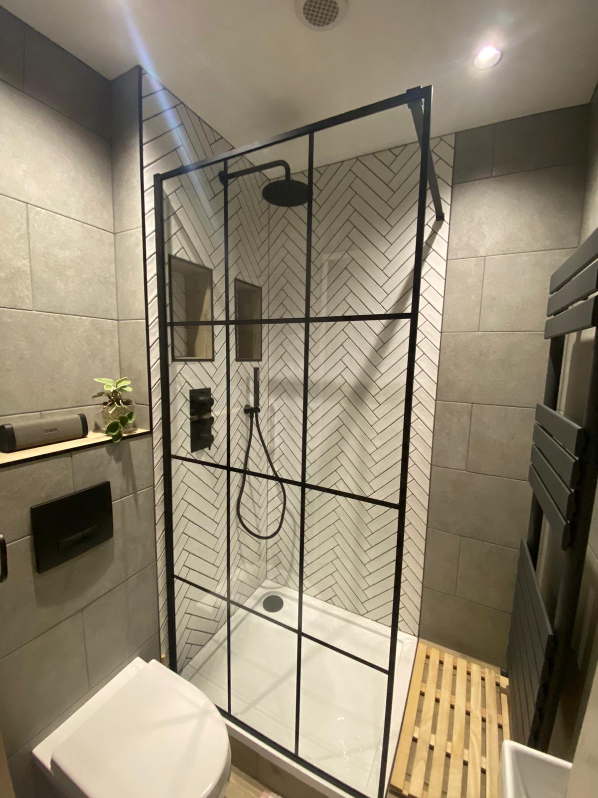 Herringbone & stone walk-in shower